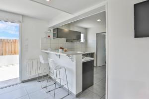 Maisons de vacances La tranquilite bleue - Maison avec Parking cloture : photos des chambres