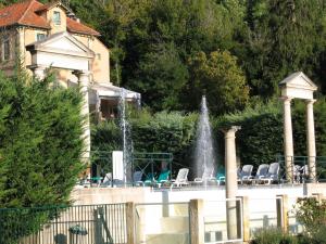 Appartements A beautiful 2 persons studio in a chateau with swimming pool : photos des chambres