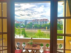 Aman Riverside Hotel