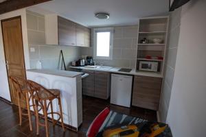 Appartements L'APARTE - le studio Les Vignes : photos des chambres