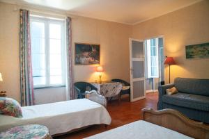 B&B / Chambres d'hotes Les Volets Bleus : photos des chambres