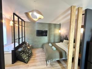 Appartements Craft Home - Le menuisier - Balneo - Parking prive : photos des chambres