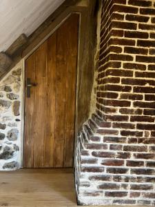 Maisons de vacances Chaleureuse ferme restauree au calme avec piscine : photos des chambres