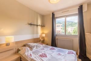 Appartements Le Roc dEmbrun - proche Lac de Serre-Poncon : photos des chambres