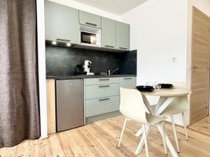 Appartements La Scene de Moliere - Neuf - Clim - Central - Fibre : photos des chambres