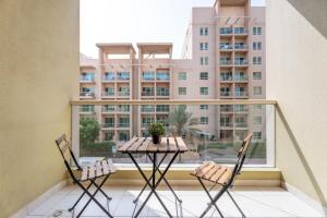 GuestReady - Furnished 1BR+Sofa | Al Alka Greens