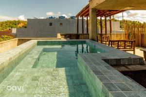 Casa com Piscina Privativa Lambari 107 by Qavi