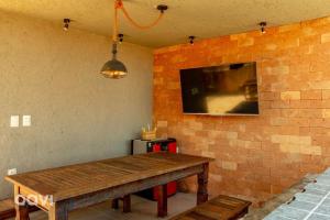 Casa com Piscina Privativa Lambari 107 by Qavi