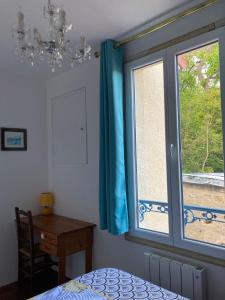 Maisons de vacances Maison avec vue sur la foret a 2 pas de la gare : photos des chambres
