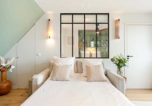 Appartements New loft with terrace & jacuzzi near Montparnasse : photos des chambres