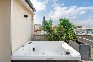 Appartements New loft with terrace & jacuzzi near Montparnasse : photos des chambres