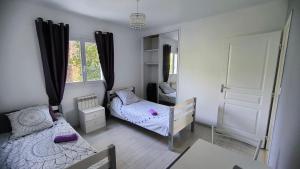 Maisons de vacances Maison avec piscine : photos des chambres