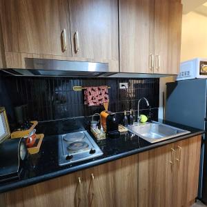 MOA Staycation The Baycourt at Shore Residences Near Mall of Asia IKEA NAIA SMX Convention Center MOA Concert Grounds