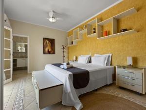 Mansão com 5 suites Piscina Churrasqueira Ar condicionado