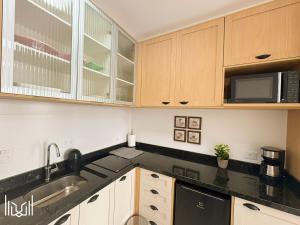 Apartamento Central próximo ao Jardim Botânico, Shopping Estação e UFPR - IBIZA STÚDIO