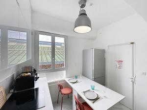 Appartements Colombes - Home Cinema pres de La Defense et Paris : photos des chambres
