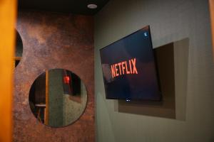 Appartements Under sea jacuzzi privee 5 in du centre vill place de stationnement privee possible : photos des chambres