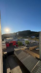 Apê centro de Capitólio- Condomínio Monitorado - 4º Andar - Vaga de Garagem