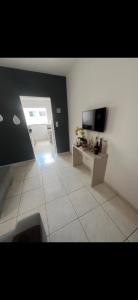 Apê centro de Capitólio- Condomínio Monitorado - 4º Andar - Vaga de Garagem