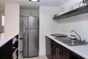 State of the Art Condos en la mejor Playa de Cancun frente a PLAZA LA ISLA