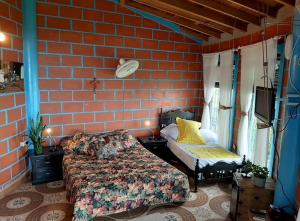 Bed and bath at Villacarolina