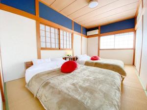 無料レンタサイクル -Guest House 団- 最大16名,難波まで2駅5分,USJまで好アクセスの3階建て