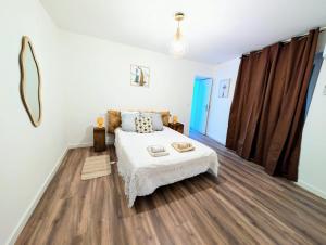 Appartements Le Loupianais : photos des chambres