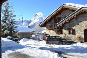 Appartements Chalet Coquelicot - confort montagnard et ambiance chaleureuse au coeur de Saint Martin de Belleville : photos des chambres