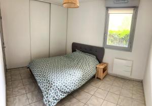 Appartements Appartement T2 avec terrasse proche Airbus : photos des chambres