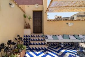 GuestHost - Romano Garden Terrace