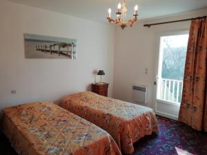 Chalets Charming Chalet with Swimming Pool in Quend : photos des chambres