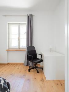 Design alpino in centro con balcone e parcheggio