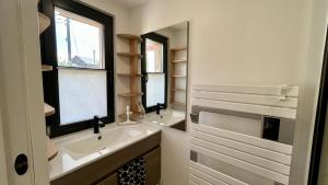 Appartements Hozanna chic & charme : photos des chambres