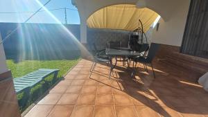 Casa con jardin privado en primera linea de playa