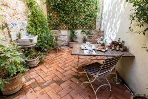 Secret Garden Apt Colosseo - Homkeey Apartments