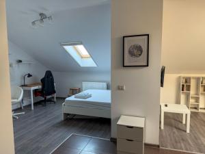 Mansarda Chiajna - 3hvězdičkové hotely ve městě Roşu