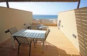 Casa Medano 33 by Rentmedano, 2 bedroomed beach front property with parking