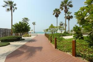 High-end Beachfront 4BR Duplex with Patio Sea and Burj View