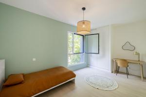 Appartements Spacious 4BR with Lovely Balcony : photos des chambres