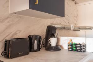 Appartements La Cite Merveilleuse - Cite - Clim - Wifi : photos des chambres