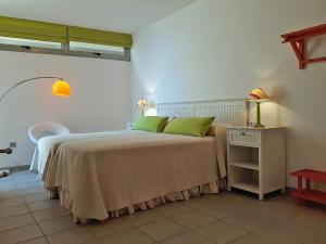 Casa Medano 40 by rentmedano, 2 bedroomed beach front apartment with parking