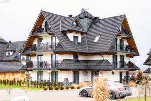 Apartamenty Grapa - Białka Tatrzańska - Darmowy Skibus - Apartament Górski z Basenem i Sauną - Blisko Term Bania i wyciągów narciarskich
