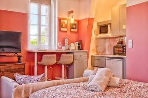 Appartements Studio de Charme Vue Mer dans Villa Belle Epoque a Houlgate : photos des chambres