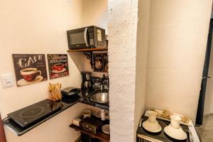 Apartamento Portofino - Totalmente climatizado - Condomínio beira-mar e próximo ao aeroporto - Praia de Itapuã