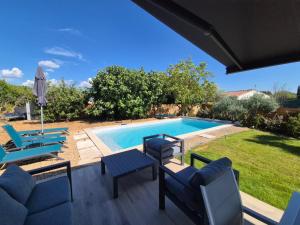 Villas Villa neuve avec piscine : photos des chambres