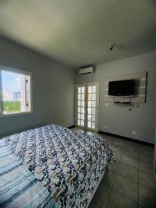 Casa pet friendly Guarujá condomínio Jardim Acapulco