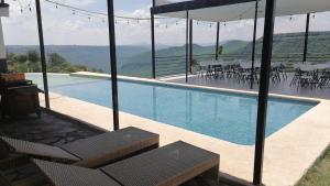 Cabaña con picina Panorámica