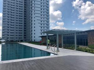 Relaxing 1Br in Quezon City, garden view with pool & mall