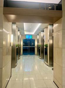 Relaxing 1Br in Quezon City, garden view with pool & mall