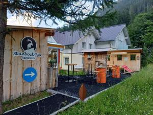 Haus Capricorn - Garten Appartement - Bergdorf Gargellen 1423m